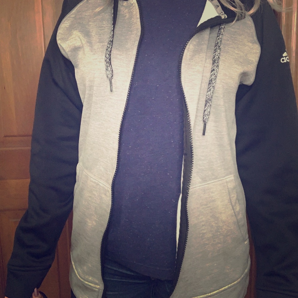 Grey Adidas zip up sweater.